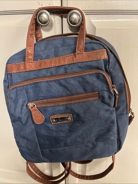 Navy Blue Backpack with Brown Trim